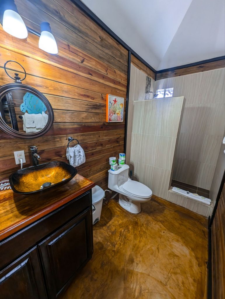 lina point overwater resort hotel review belize ambergris caye bathroom
