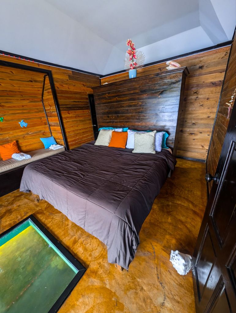 lina point overwater resort hotel review belize ambergris caye bedroom